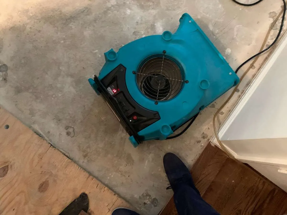 Air mover drying subfloor during Leak Detection & Repair in Ladera Ranch